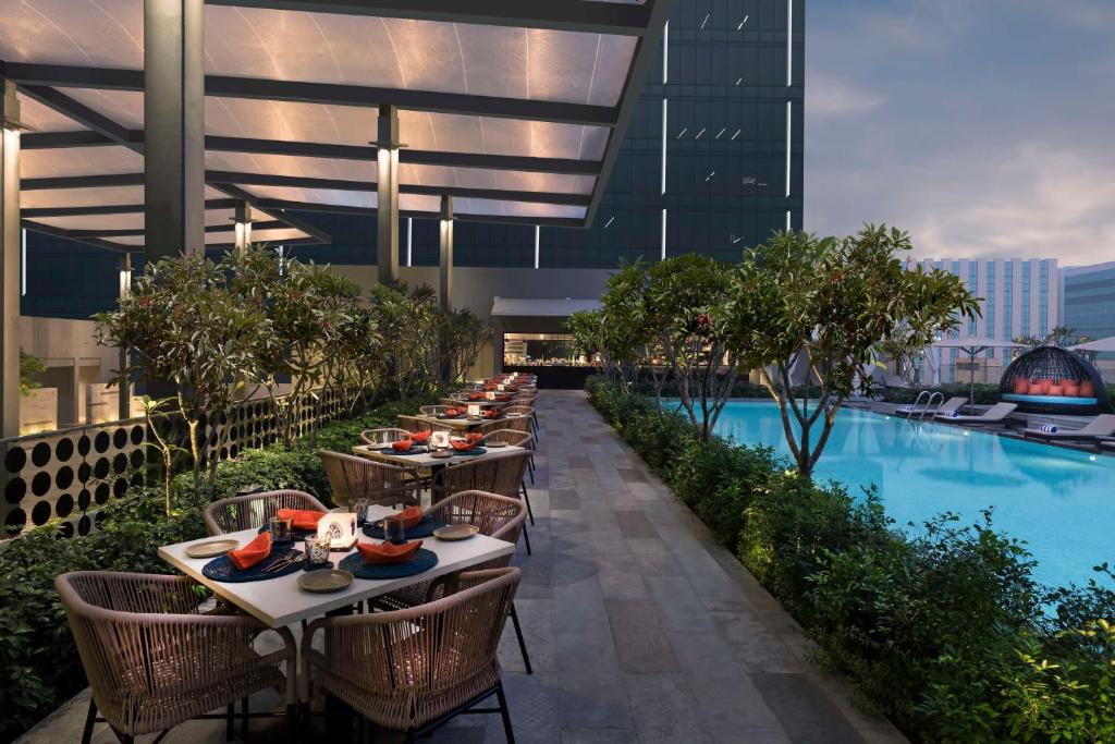 Hilton Bangalore Embassy Manyata Business Park lawn view Hilton Bangalore Embassy Manyata Business Park lawn view