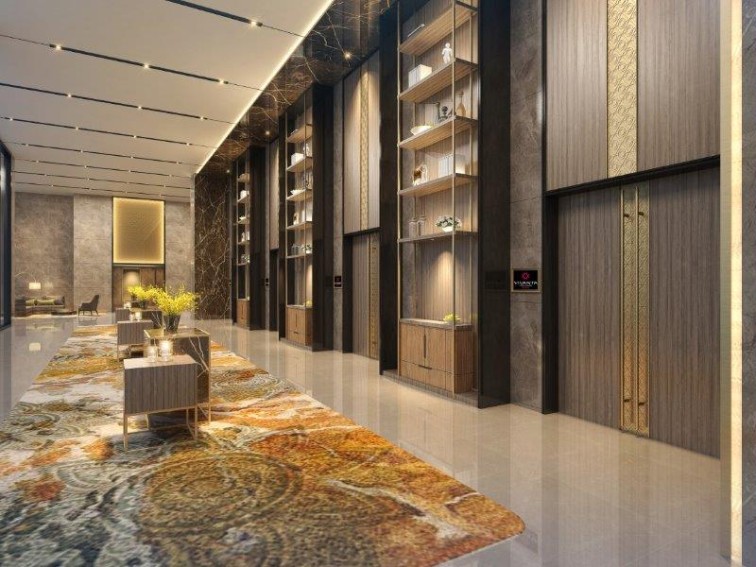 lobby with carpet and table lobby with carpet and table