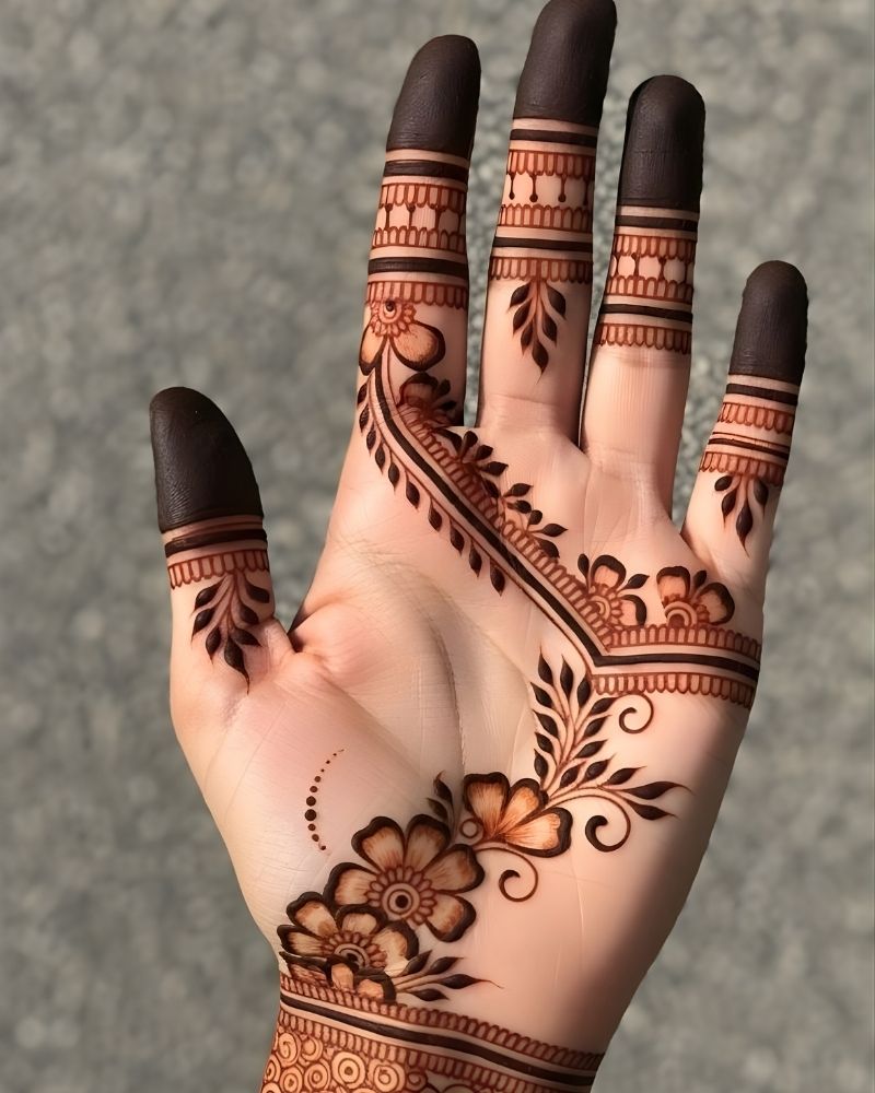 Front hand simple mehndi design with balanced patterns